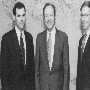 Photo of Todd Ulmer and Kevin Grimes ('93-'94) with Defense Secretary William Perry.