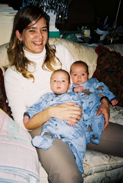 Claudia Holding Twins